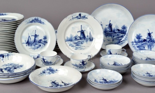 Assorted Group of German Porcelain Articles: 20th century. Approximately 55 pieces. Blue and white porcelain partial dinner service consisting of bowls, plates, cups, saucers, etc.