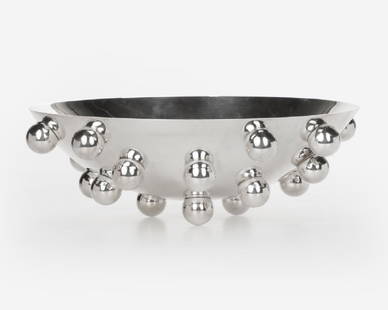 A Christofle ''Atomes d'Argent'' centerpiece bowl: 20th century, maker's marks to rim, designed by Richard Hutten, a silver-plated bowl, of wide shallow form with applied spheres to exterior, 4.25'' H x 13.25'' Dia., est: $500/800 Provenance: Property