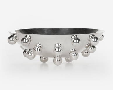 A Christofle ''Atomes d'Argent'' centerpiece bowl: 20th century, maker's marks to rim, designed by Richard Hutten, a silver-plated bowl, of wide shallow form with applied spheres to exterior, 4.25'' H x 13.25'' Dia., est: $500/800Provenance: Property