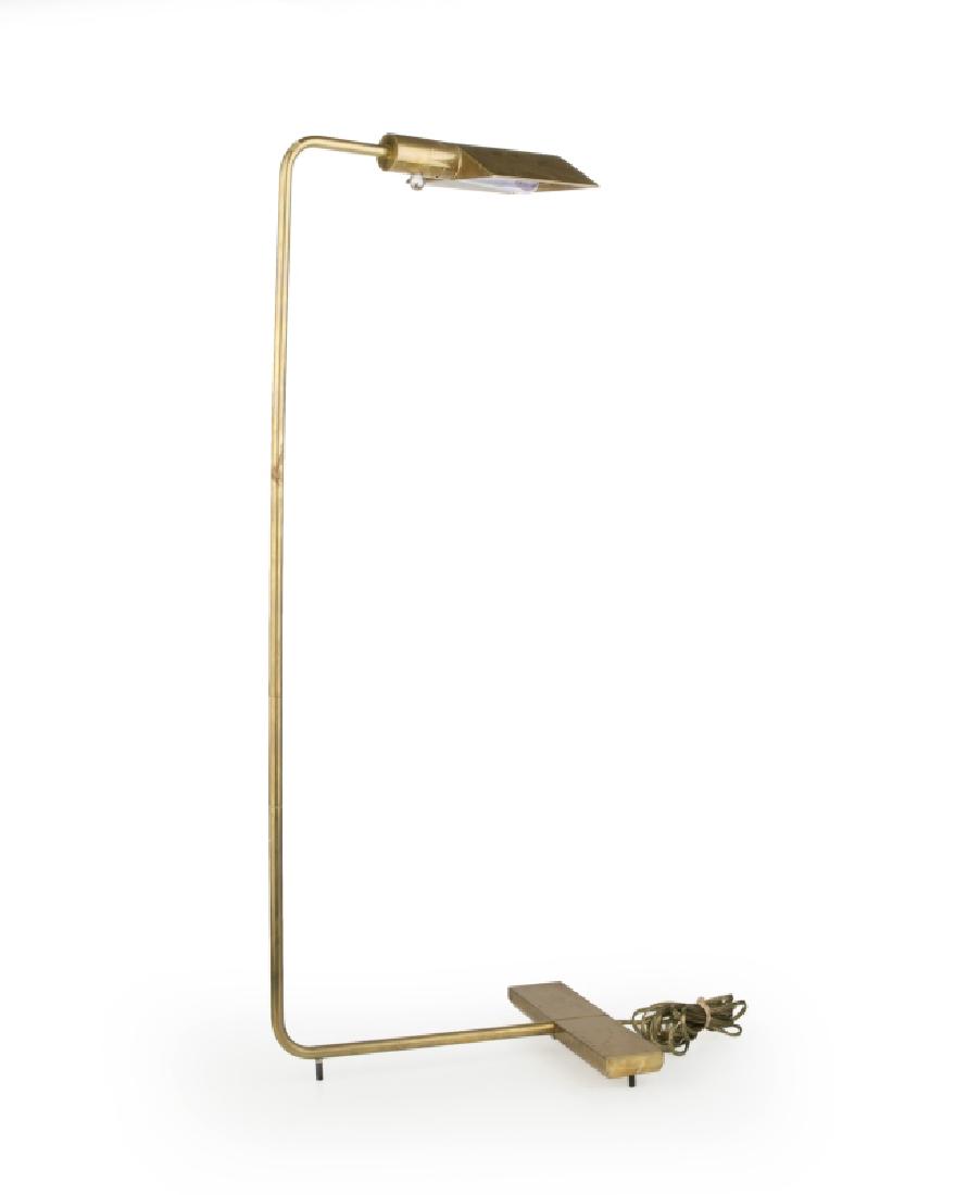 A Cedric Hartman pharmacy-style reading lamp: Circa 1970s, marked to underside: Cedric Hartman / [impressed signature] / Made in U.S.A. / 960133, the brass triangular shade on a tubular standard fitted with a clear Lucite ball switch, on a rectan