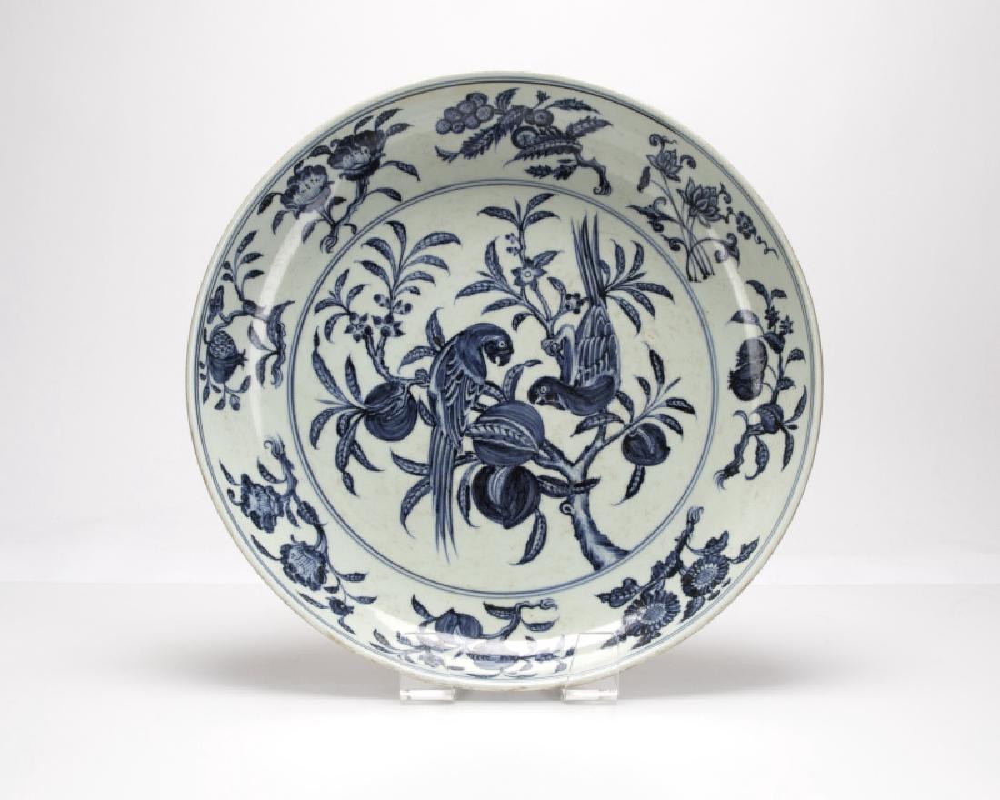 A large Ming-style blue and white pottery charger (1 of 3)