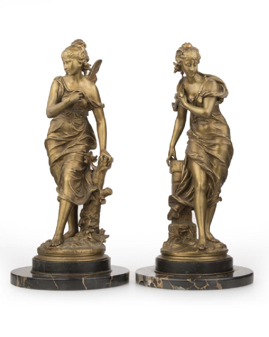 After Eutrope Bouret (1833-1906 French): Two figural bronzes, each raised on a stepped black marble base, the first: standing female fairy; the second: draped standing female figure, 2 pieces, each signed in the base: Bouret, each overall: t