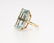 An aquamarine and gold ring - 2
