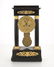 A French gilt bronze-mounted ebonized portico clock