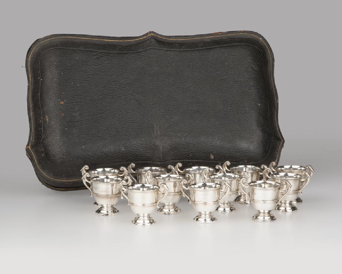 Twelve English sterling silver urn-form salt cellars (1 of 2)