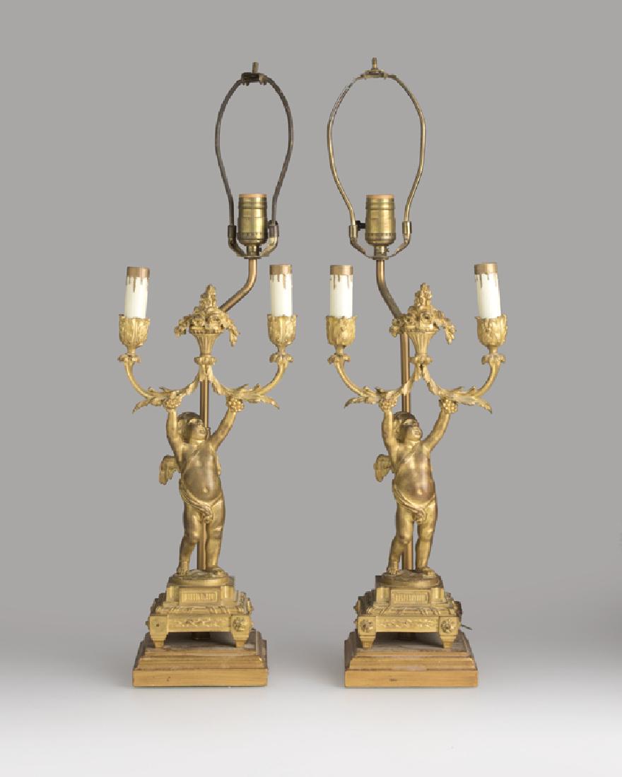A pair of French gilt-bronze table lamps (1 of 3)