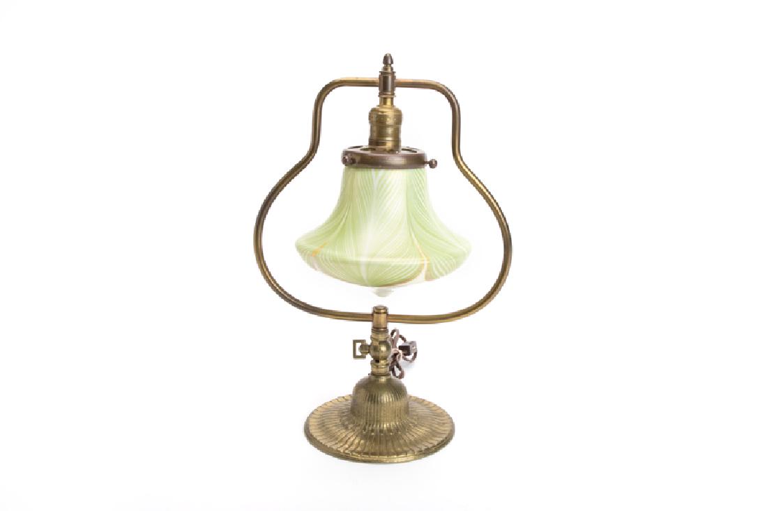 A gilt-bronze table lamp with iridescent art glass (1 of 2)
