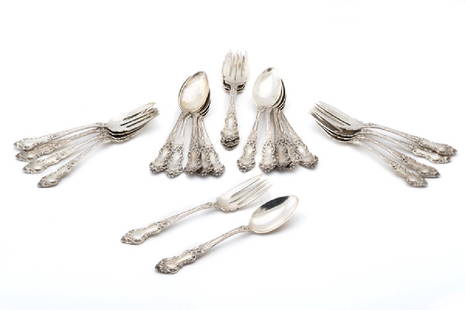 A group of miscellaneous sterling silver flatwar: Circa 1907 Marked for Watson Newell Co., Mass., Sterling In the ''Meadow Rose'' pattern designed by Joseph E. Straker, Jr., comprising 11 teaspoons (5.75'') and 12 fish forks (6''), all monogrammed, 2