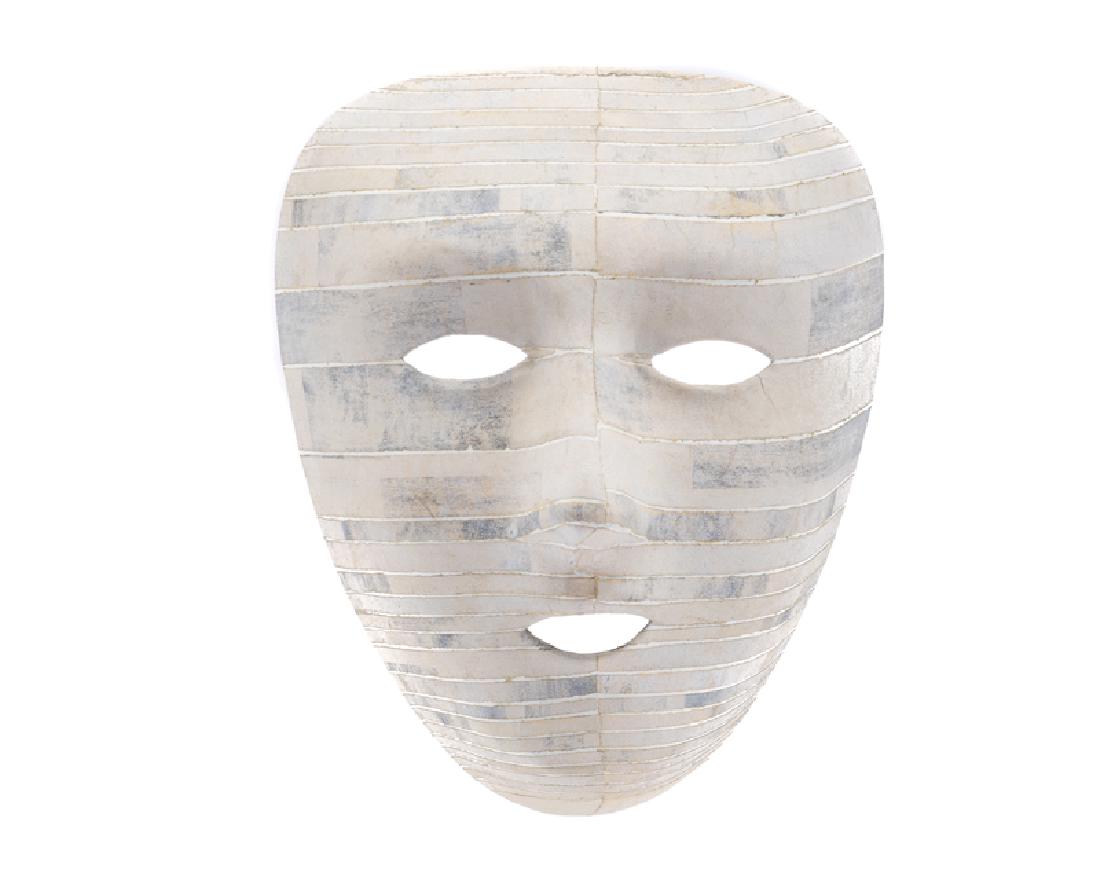 Robert Courtright (1926 - 2011 American/French): Mask Mixed media, together with a clear Lucite display case Signed and dated verso: Courtright '81 The mask: 7'' H x 5.75'' W x 3.5'' D; the case: 11.75'' H x 7.785'' W x 6.25'' D Provenance: Private
