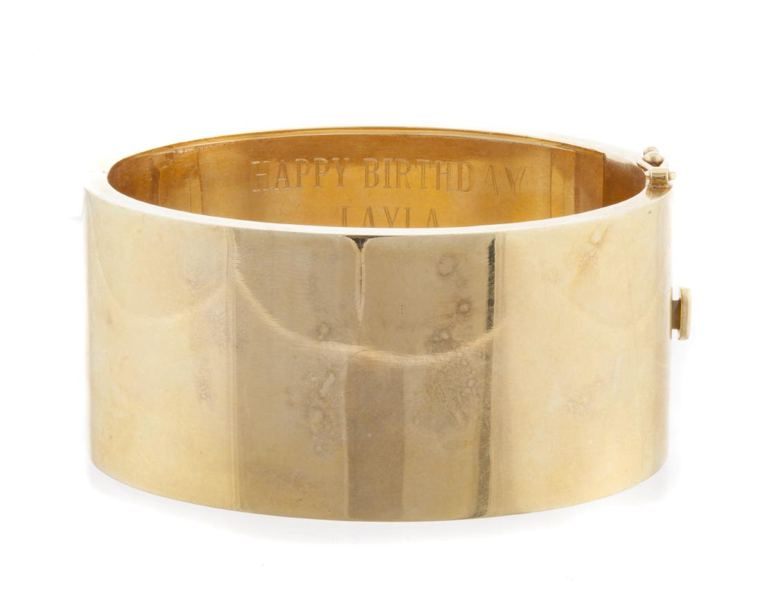 A wide hinged bangle bracelet (1 of 2)