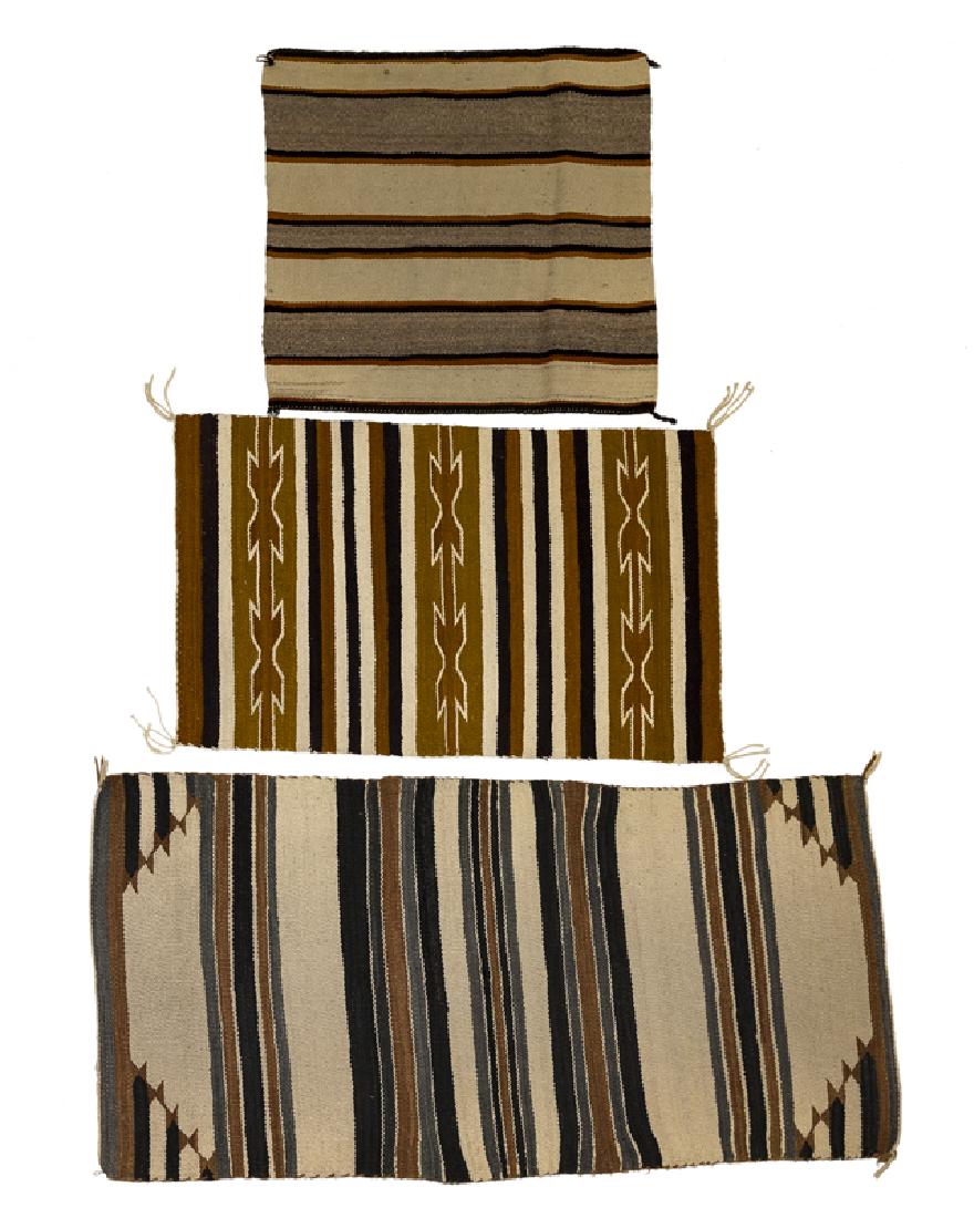 A group of three Navajo weavings (1 of 4)