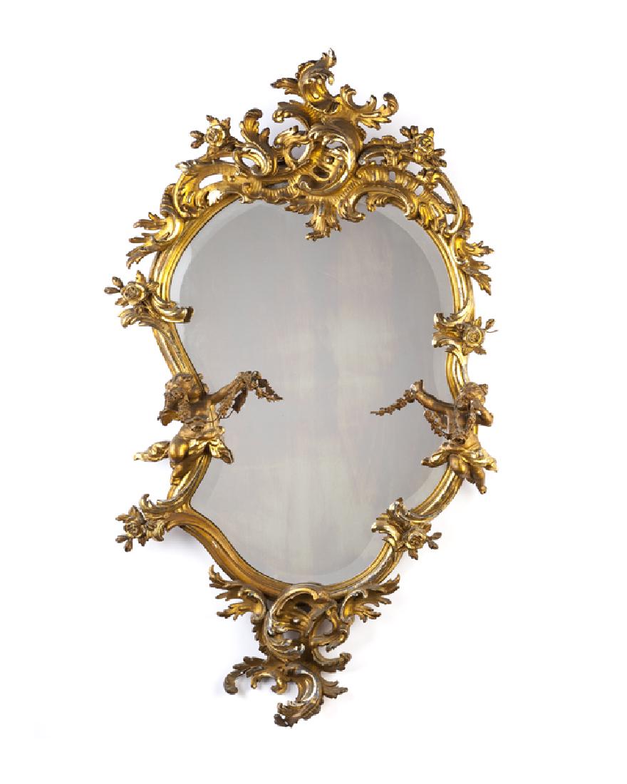 A Louis XV-style carved giltwood wall mirror (1 of 3)