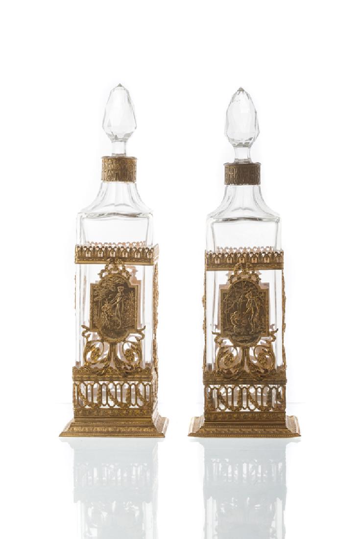 A pair of French gilt bronze-mounted crystal decanters (1 of 2)