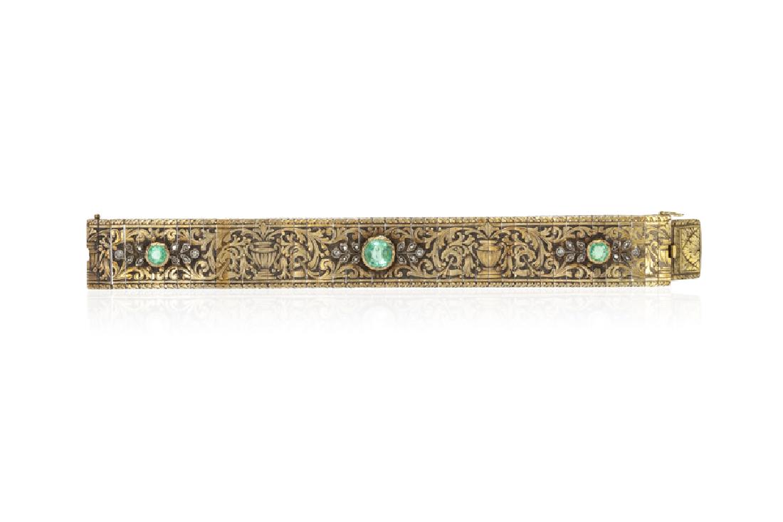 An Italian Antique emerald and diamond bracelet: Circa 1880, silver-topped 14K yellow gold Topped with three round emeralds totaling approximately 2.00 cts., and twenty-five rose and tablet-cut diamonds 3/4" H x 6 1/2" L 39.3 grams Provenance: The E