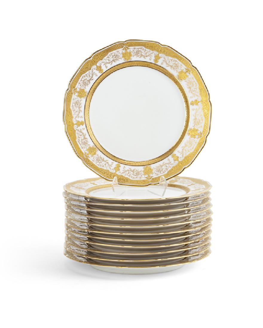 A set of twelve Limoges plates (1 of 2)