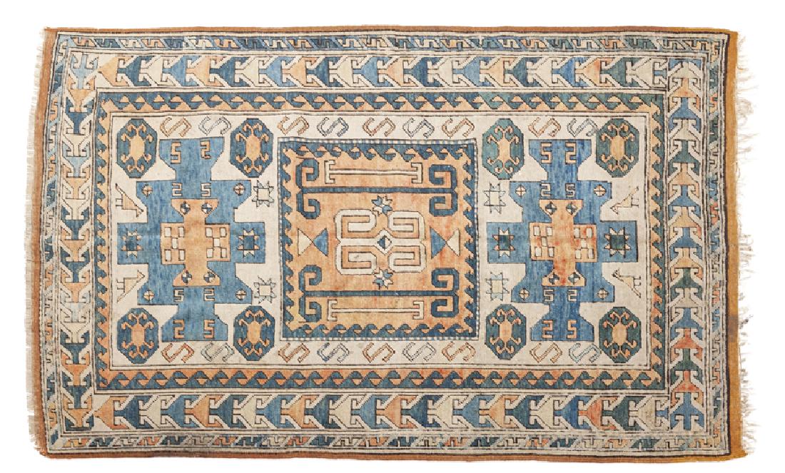 A Caucasian geometric area rug (1 of 2)