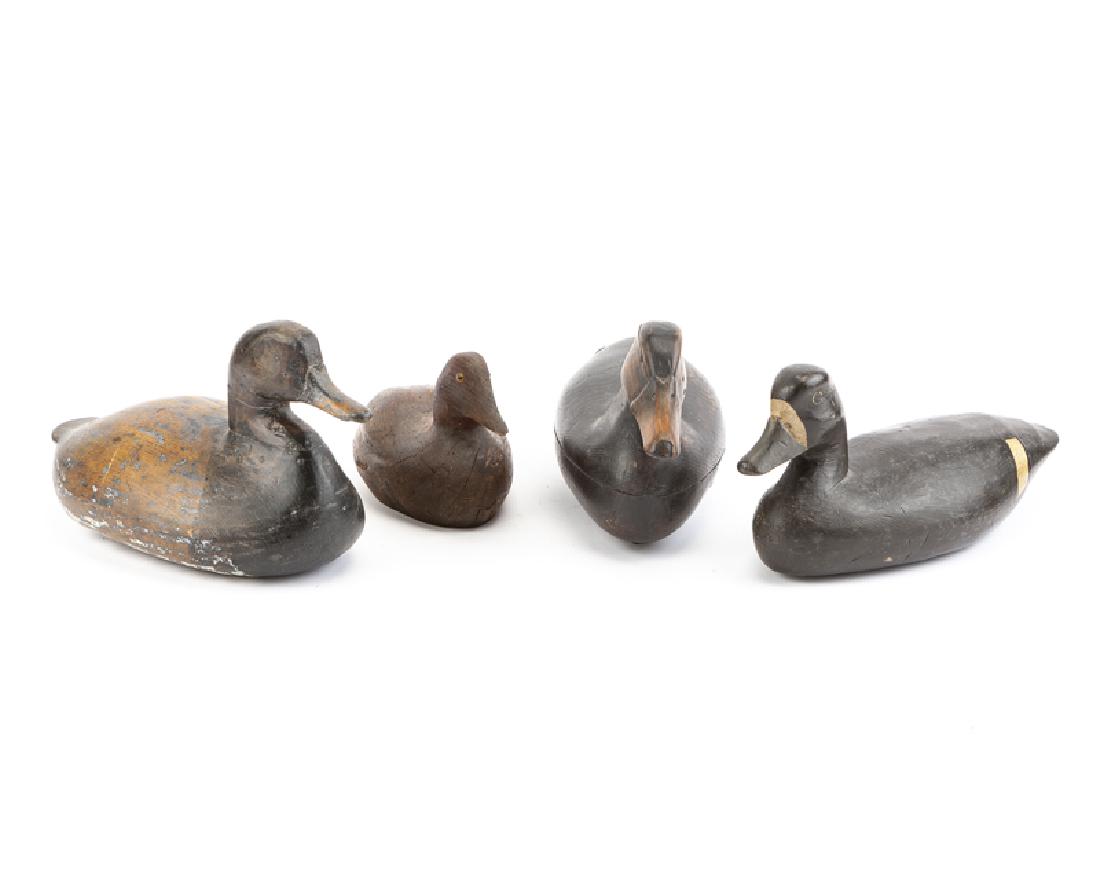 A group of four duck decoys (1 of 3)