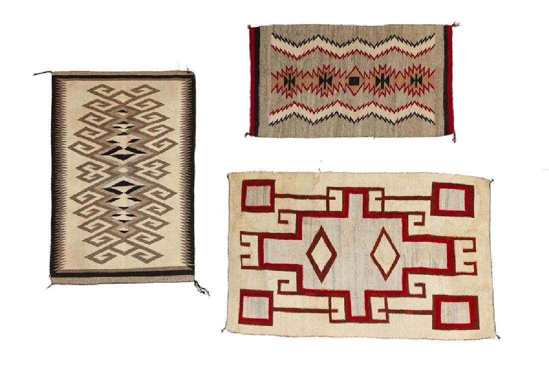 Three Navajo regional throw rugs (1 of 2)