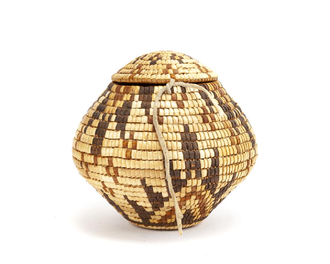 A Klickitat lidded polychrome basket (1 of 2)