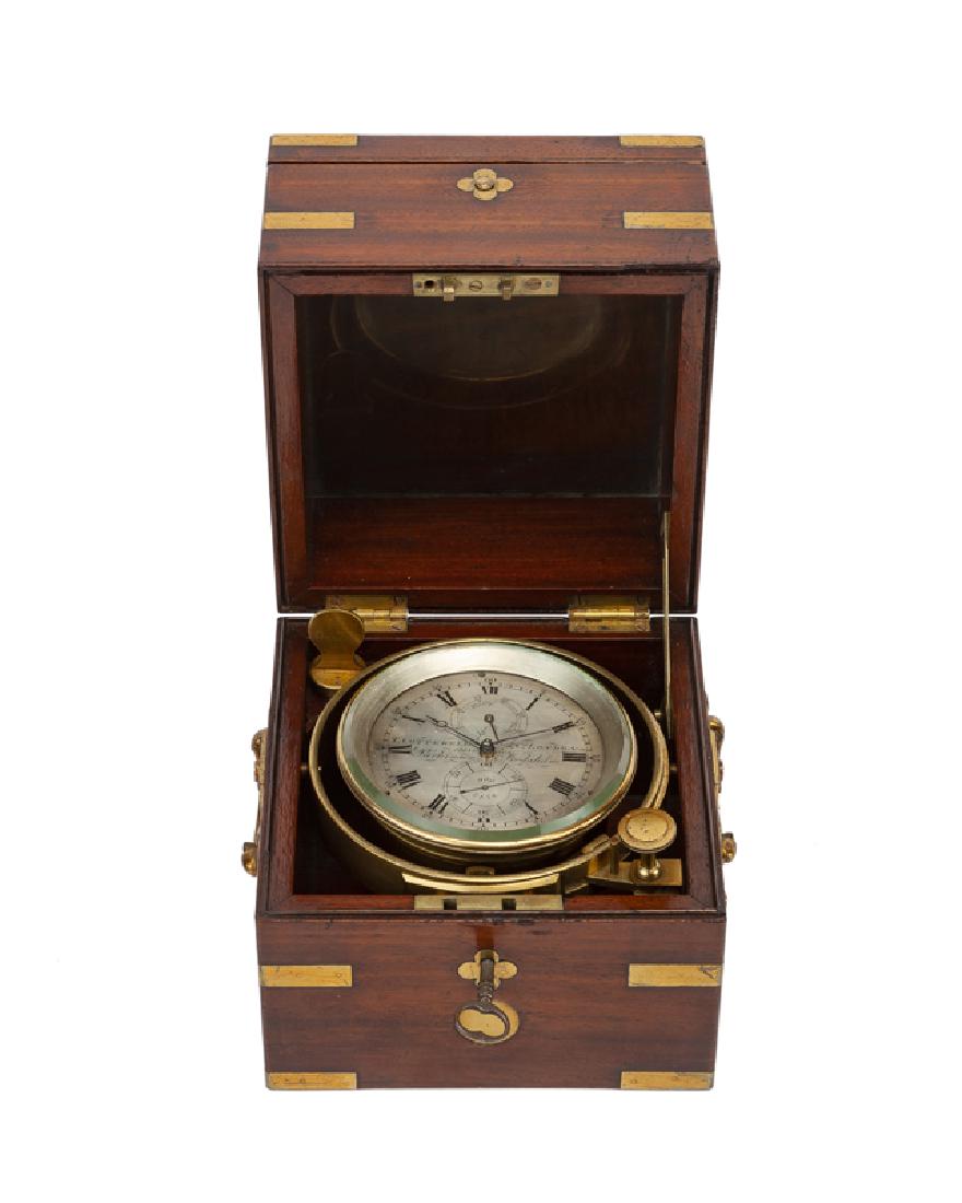 A cased nautical chronometer clock, Parkinson & (1 of 4)