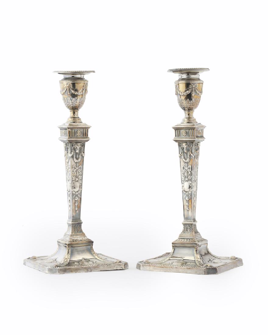 A pair of English sterling silver candlesticks (1 of 2)