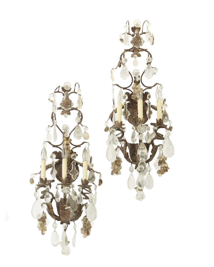 A pair of Continental iron and crystal wall sconces (1 of 1)