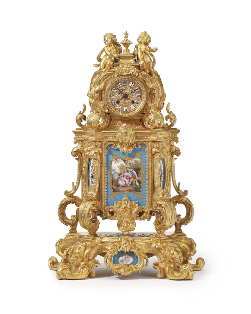 A Louis XV-style gilt-bronze and porcelain mantel clock (1 of 5)