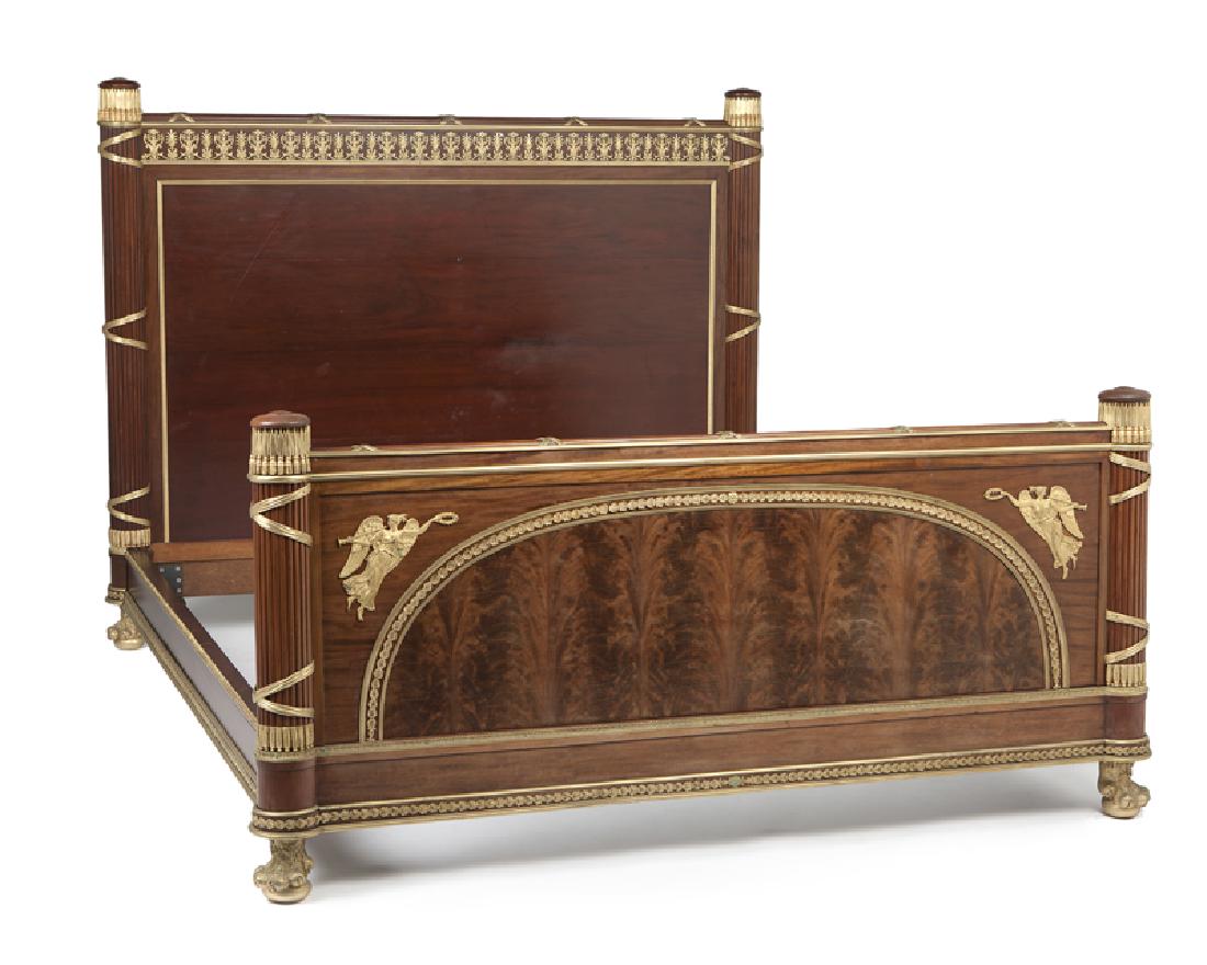 A king-size mahogany and gilt bronze-mounted bed: Last quarter 19th century, Paris Apparently unmarked, attributed to Joseph-Emmanuel Zwiener (fl. circa 1875-1900 German/French) Mahogany over oak secondary wood, the headboard surmounted by a gilt-bro