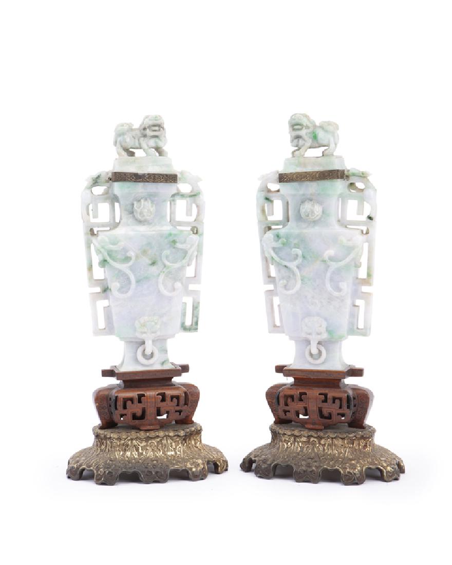 A pair of Chinese carved ''snow and moss'' jade bottles (1 of 3)