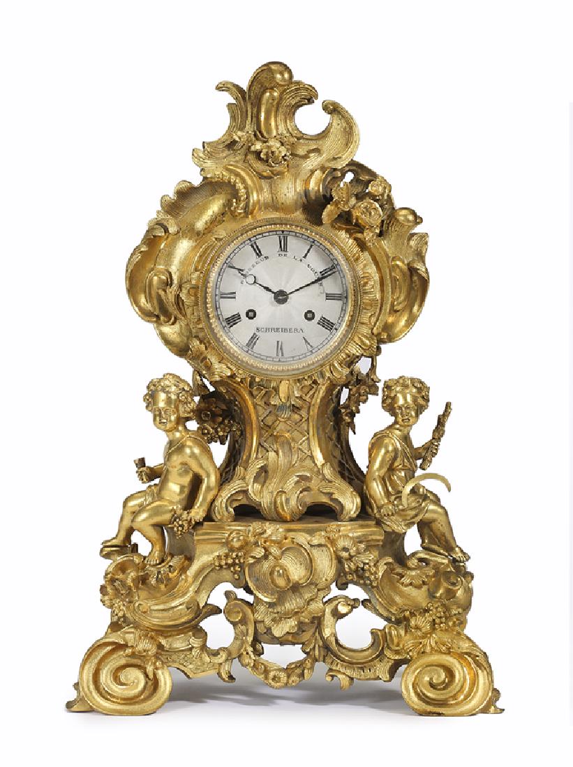 A Louis XV-style gilt-bronze mantel clock (1 of 4)