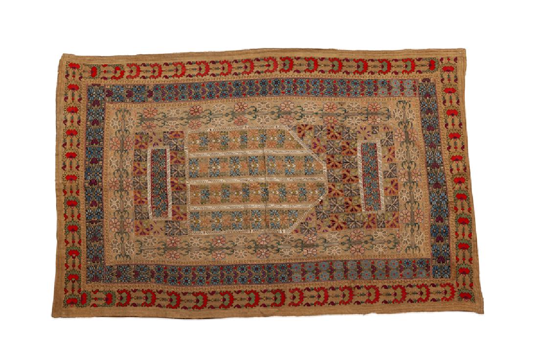 A hand-embroidered cotton prayer mat (1 of 2)