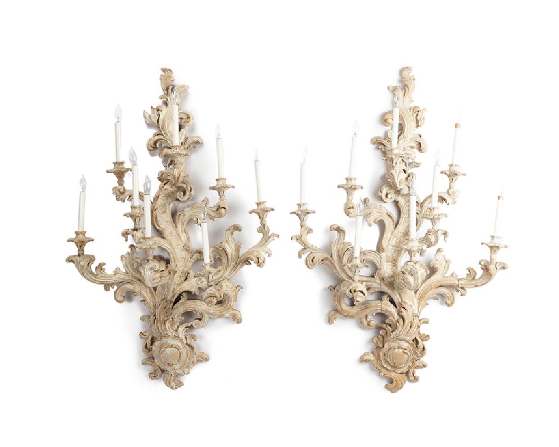 A pair of carved candle sconces (1 of 2)