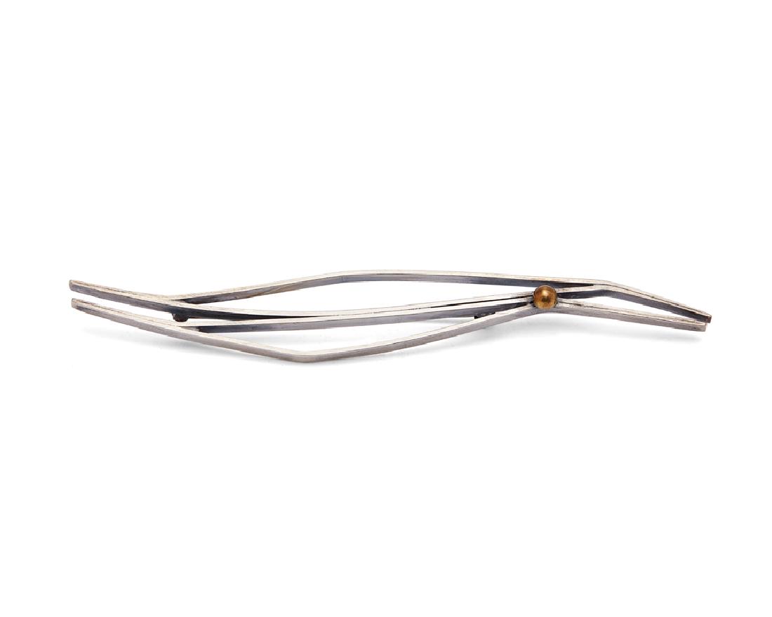 A sterling silver abstract bird brooch, Betty Cooke (1 of 2)