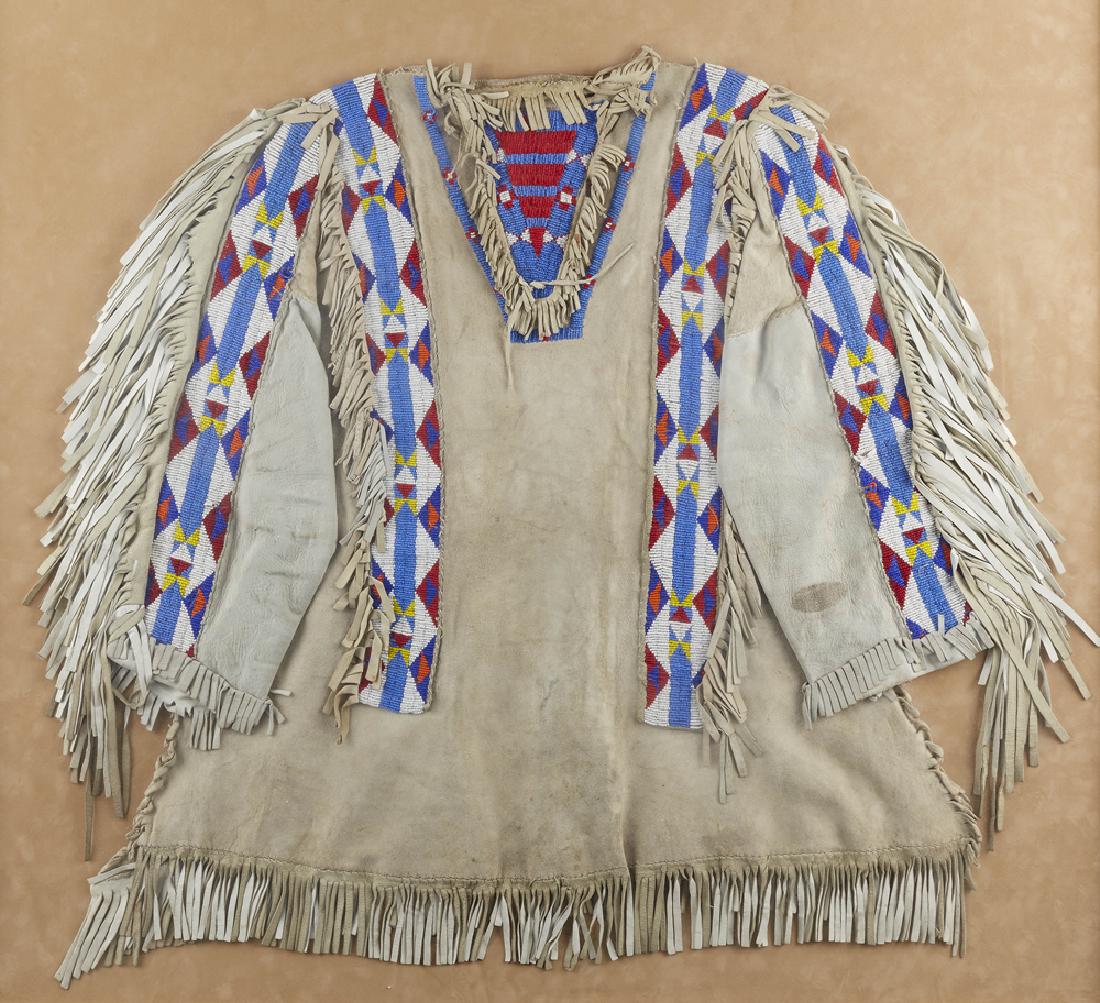 A framed Plains beaded war shirt (1 of 3)