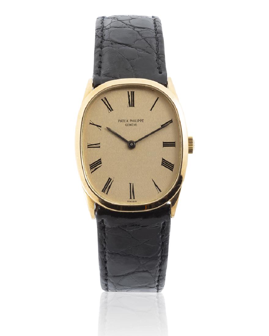 A Patek Philippe 18k gold wristwatch (1 of 2)