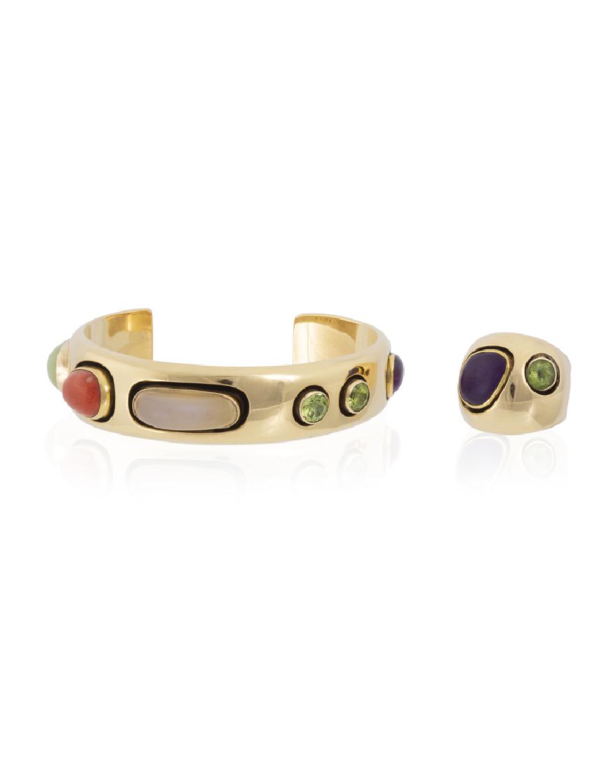 A set of multi-colored gemstone and gold jewelry: Each stamped for 18k yellow gold; the bangle signed: KIM; the ring stamped: K Set with moonstone, peridot, coral, and quartz, comprising a ring and a cuff bracelet inscribed to underside: going about