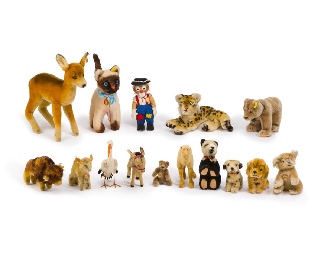 A group of Steiff stuffed animals: Second half 20th century Grizzly numbered: 1317/02; "Bison" numbered: 3112.90; Comprising: a grizzly bear (5.5" H x 7.75" W x 4.5" D), "Bison" (4" H x 6.5" W x 2.625" D), "Revue Susi" the cocker spani