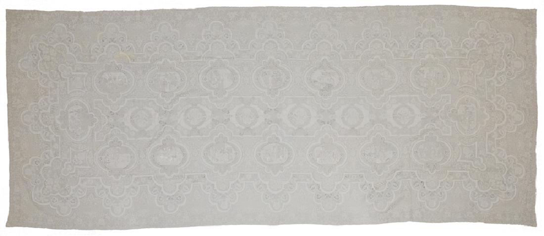 A Continental opera-themed lace banquet tablecloth: First quarter 20th century Comprised of machine-made lace panels set between linen cutwork hand-embroidered with eighteen vignettes of operatic scenes likely including: "Madam Butterfly," 1904, Giacom