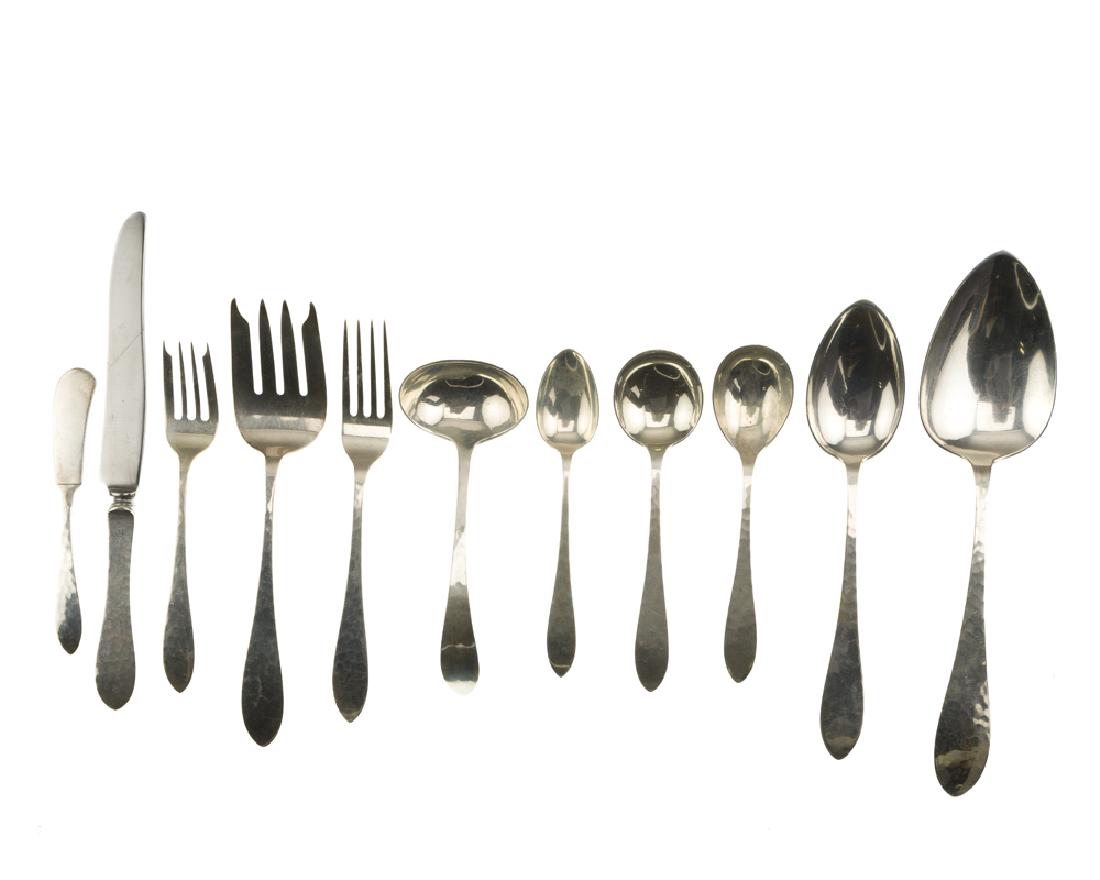 A Porter Blanchard sterling silver flatware service: 20th century Each stamped: O / Porter Blanchard / Handmade Sterling The hand-wrought partial service for six, comprising: 10 New French hollow-handled knives (9.5"), 6 flat-handled butter spreaders (5