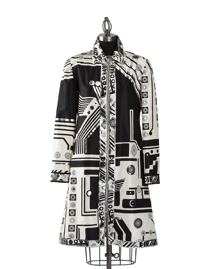 A Leonard silk jacket: Late 20th/early 21st century Label to interior seam: Taffettas / 38; Signed to pattern: Leonard Zippered closure, silk fabric with Art Deco-style geometric black, white and silver pattern Collar to he
