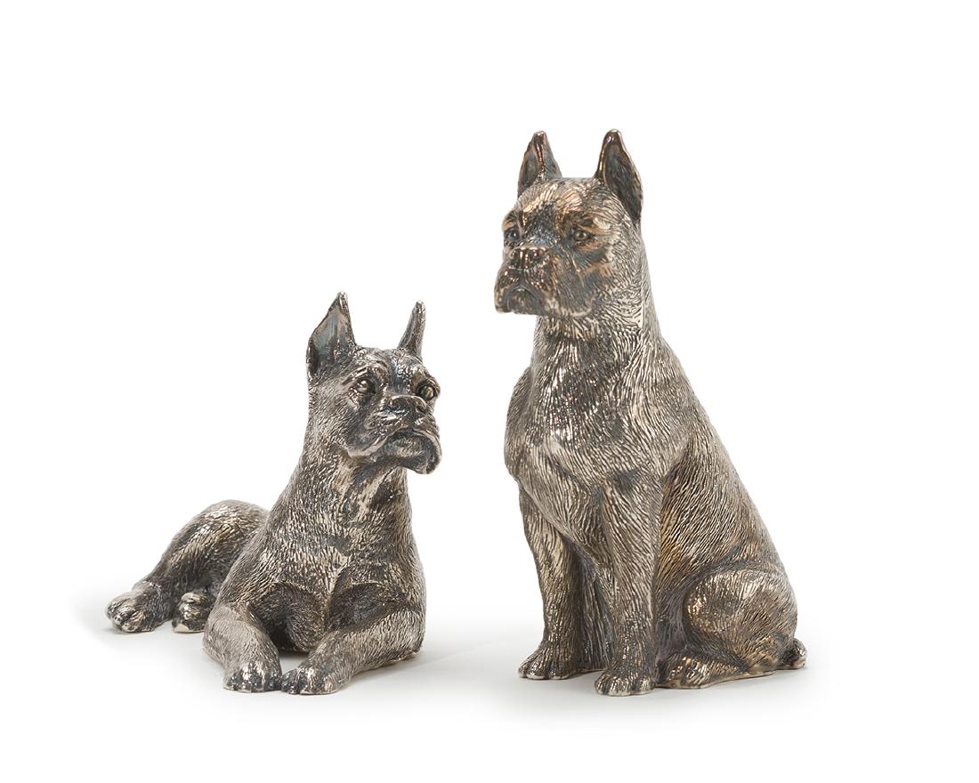 A pair of Israeli sterling silver boxer dogs: Contemporary The first marked: Lisham Art 925; Further marked: 1988 with copyright symbol; The second marked: 925 / Brue One laying down and one seated Larger: 5.25" H x 3.5 " W x 2" D 14.75 oz troy a