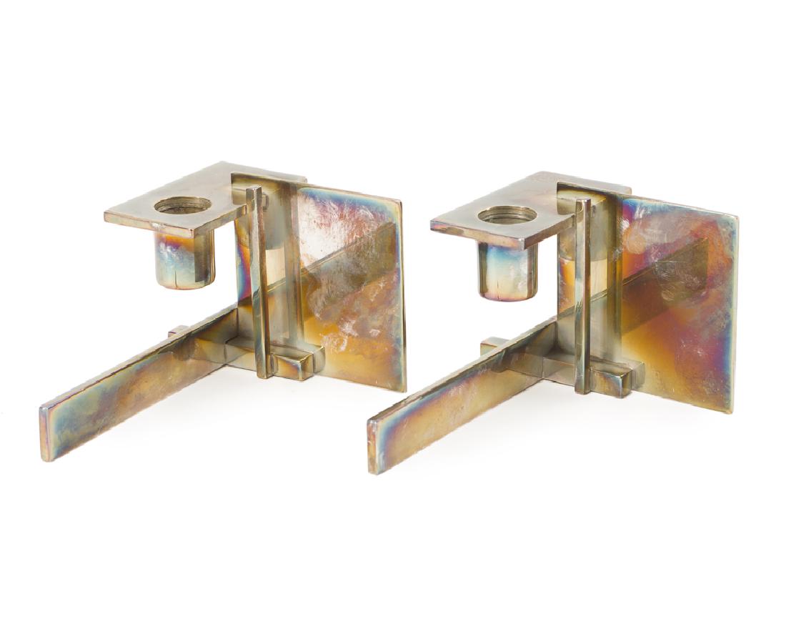 A pair of Swid Powell silver plate candlesticks (1 of 2)