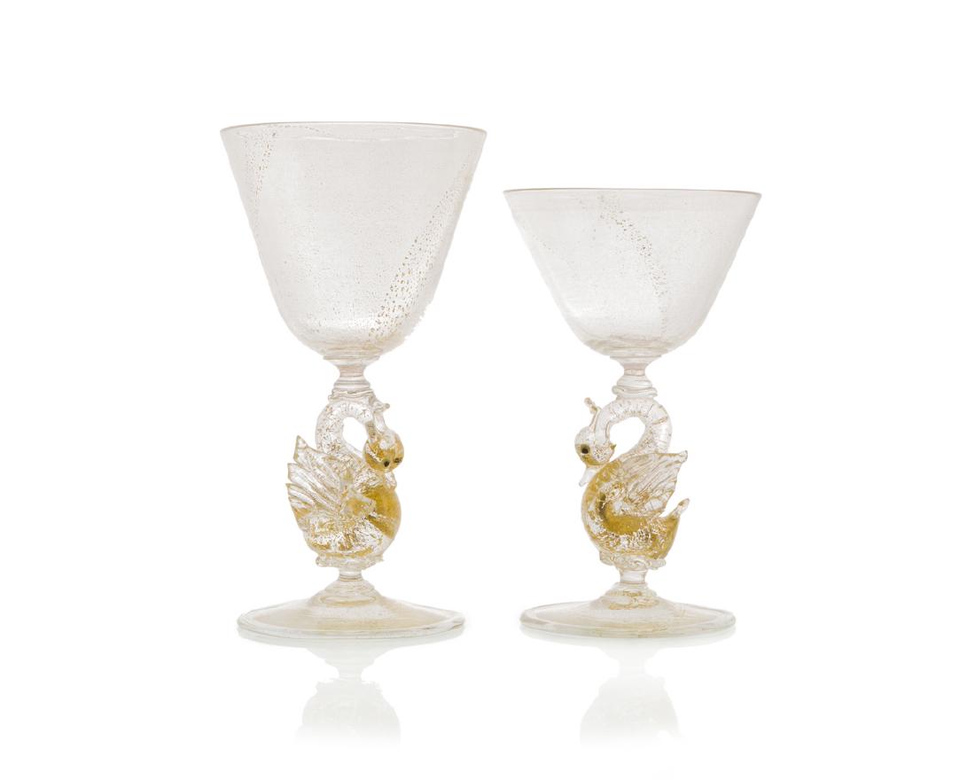 A group of Salviati swan-motif glassware: Third quarter 20th century Comprising eleven white wine (6.125") and eleven cordial glasses (5.5") with swan stems, 22 pieces