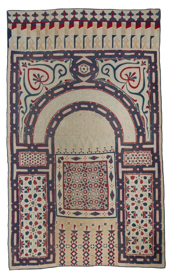 An Art Deco Egyptian Revival wall hanging: Circa 1920 Appliqué cotton on cotton and linen in the form of a doorway with Arabic calligraphy 121" H x 73" W
