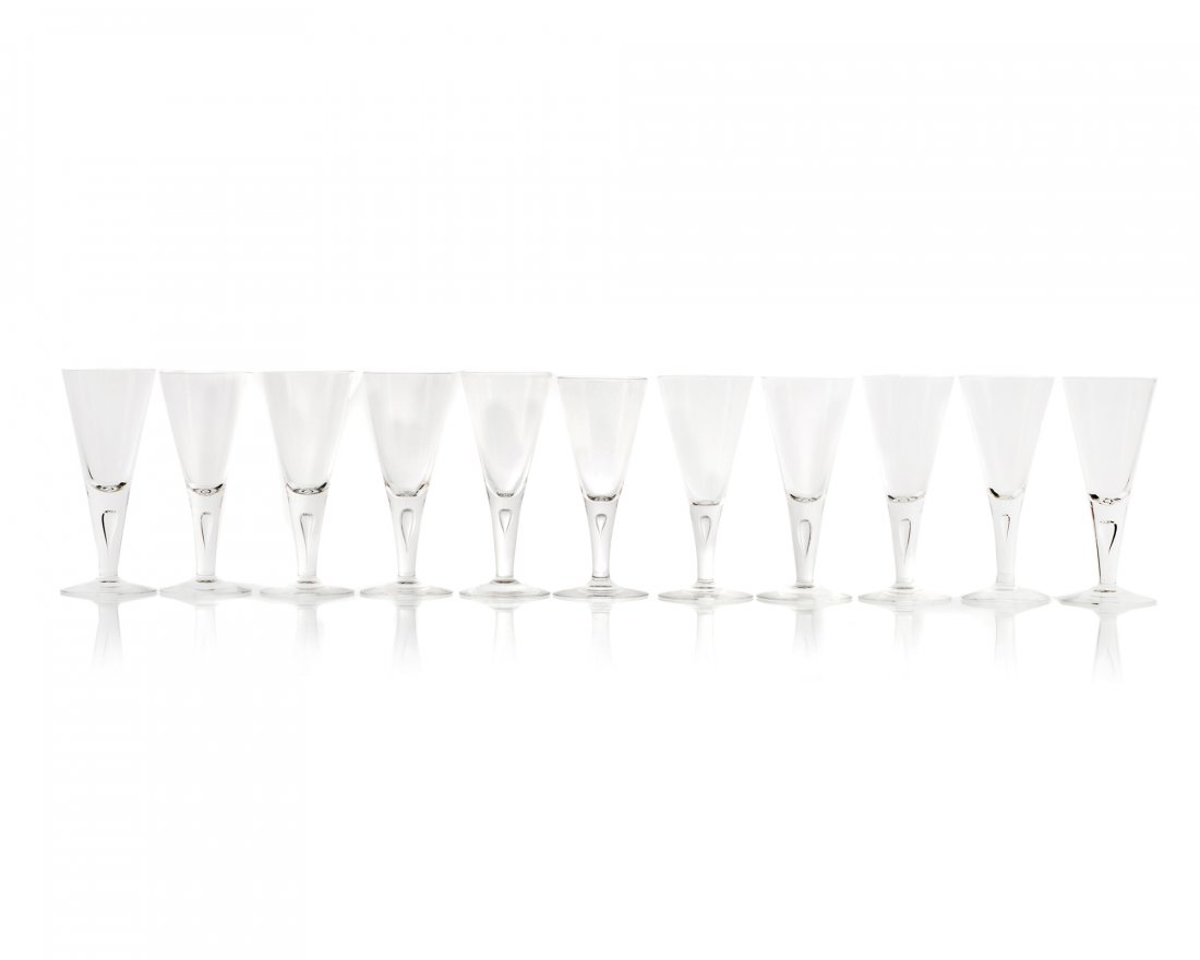 Eleven Steuben claret wine glasses: Second quarter 20th century Each signed: Steuben In original box, 11 pieces Each: 6.25" H x 2.625" Dia.
