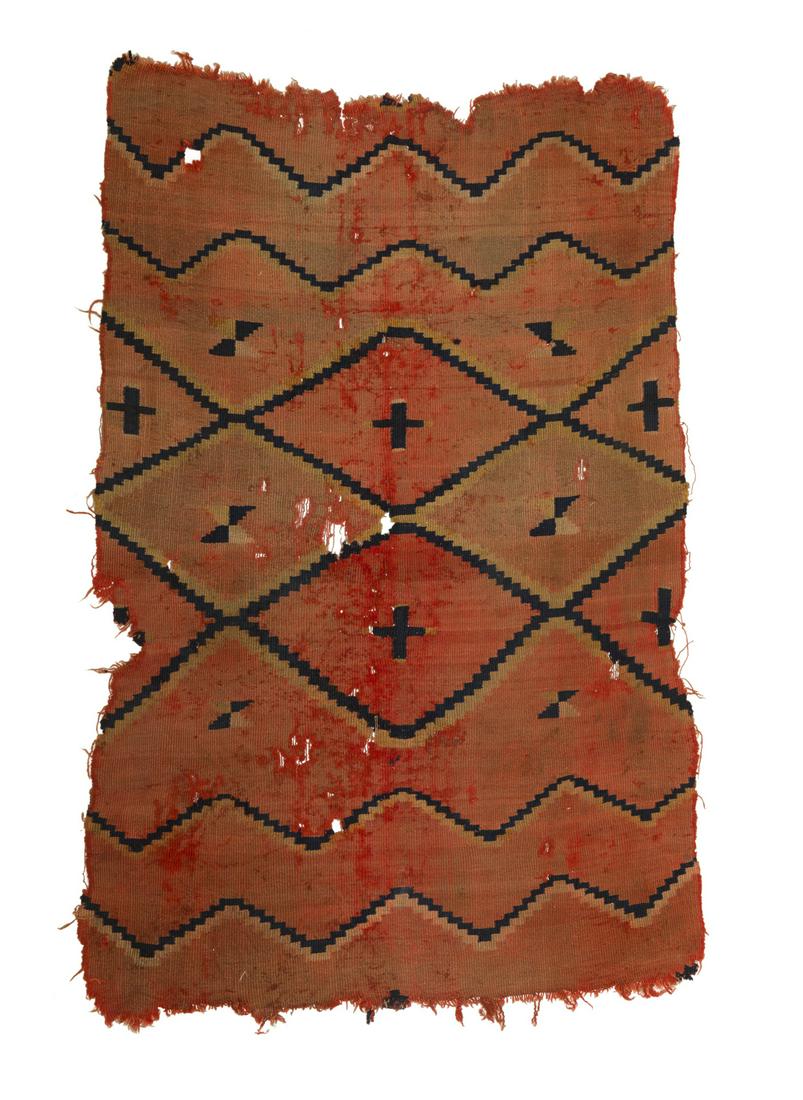 A framed Navajo textile fragment (1 of 4)