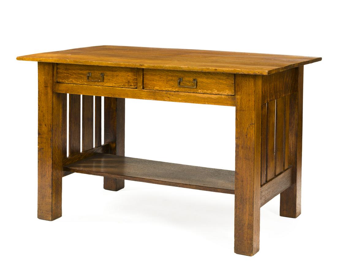 An Arts & Crafts oak library table (1 of 3)
