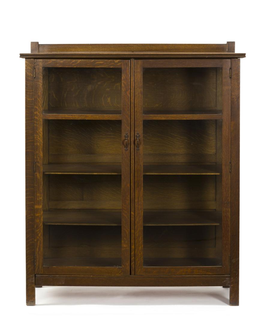 An Arts & Crafts oak double-door china cabinet (1 of 2)