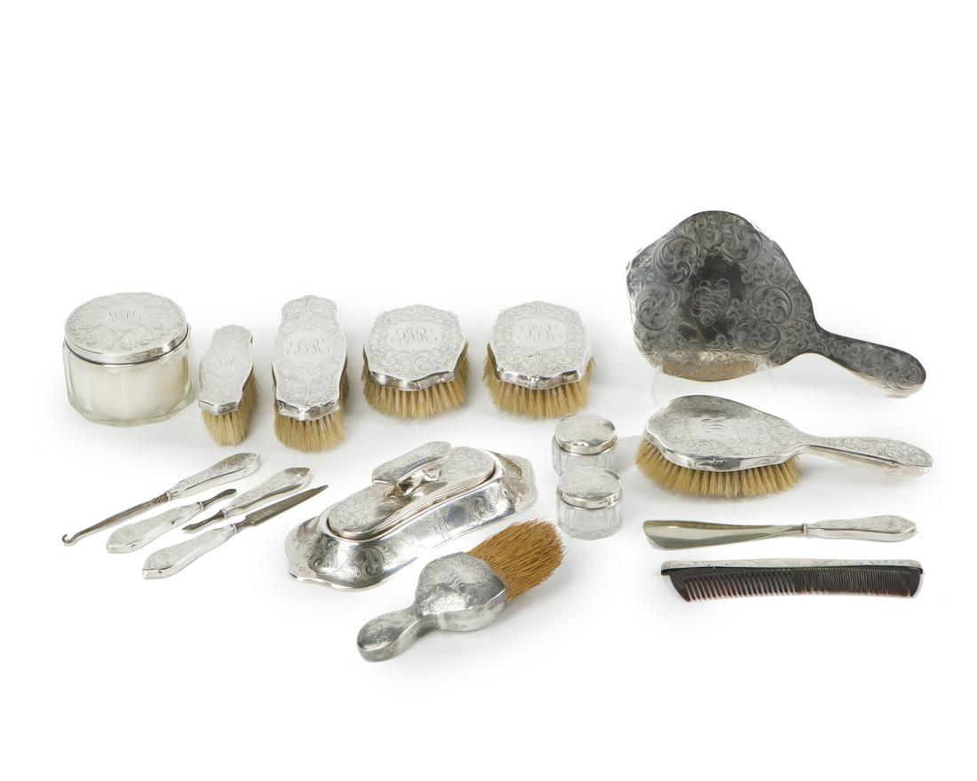 A seventeen-piece sterling silver vanity set (1 of 2)