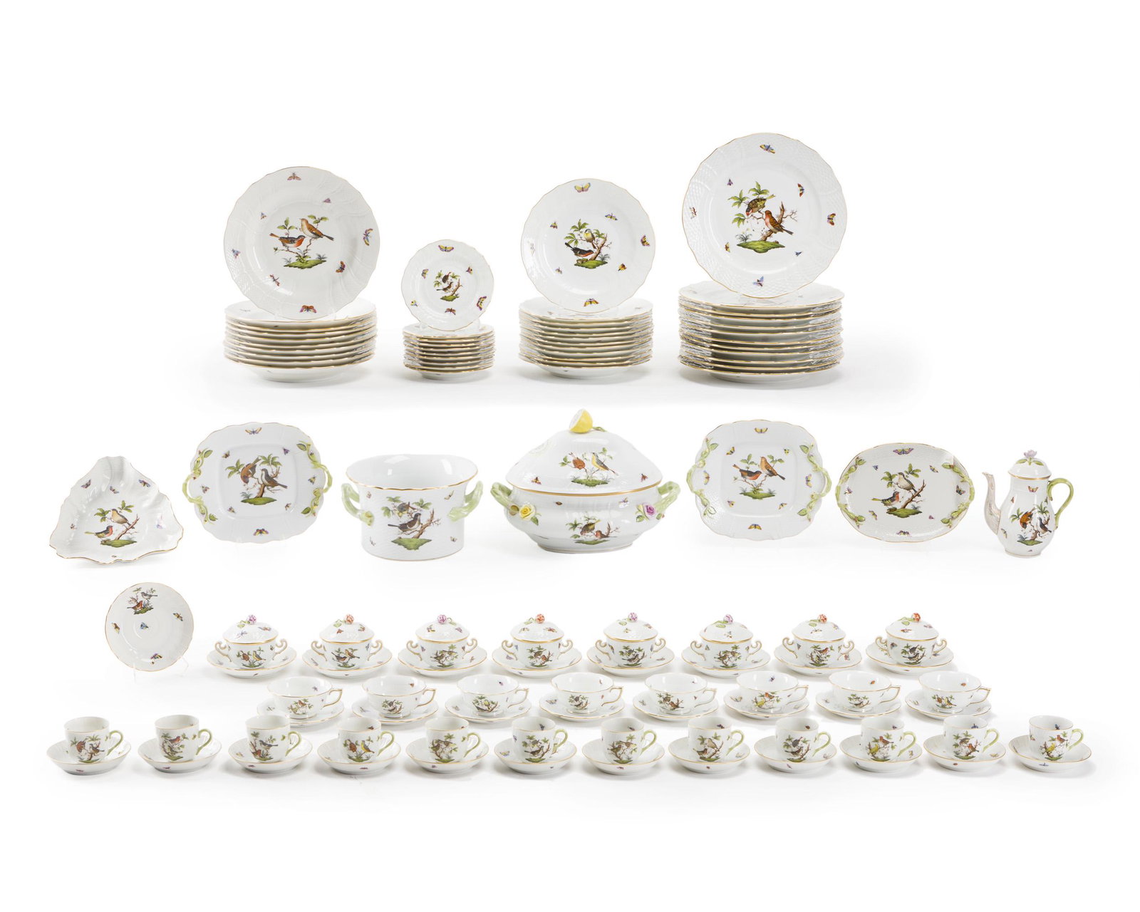 A Herend "Rothchild Bird" porcelain service: 20th century Marked Herend Hungary Hand Painted; Each numbered Comprising of 12 dinner plates (1" H x 10.75" Dia.), 12 luncheon plates (1.25" H x 9" Dia.), 10 pasta bowls (1.325" H x 10" Dia.), 10 b